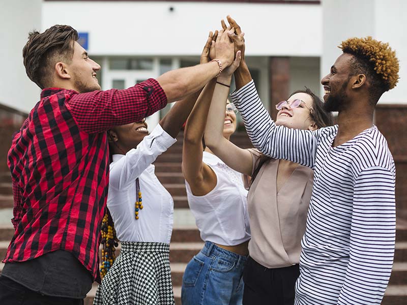 saap-800_0002_students-giving-five